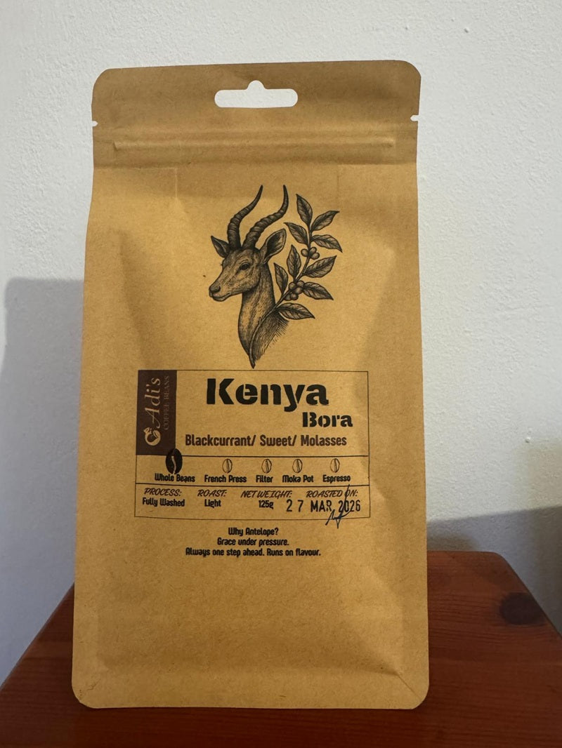 Freshly roasted coffee beans UK with a visible roast date on the label